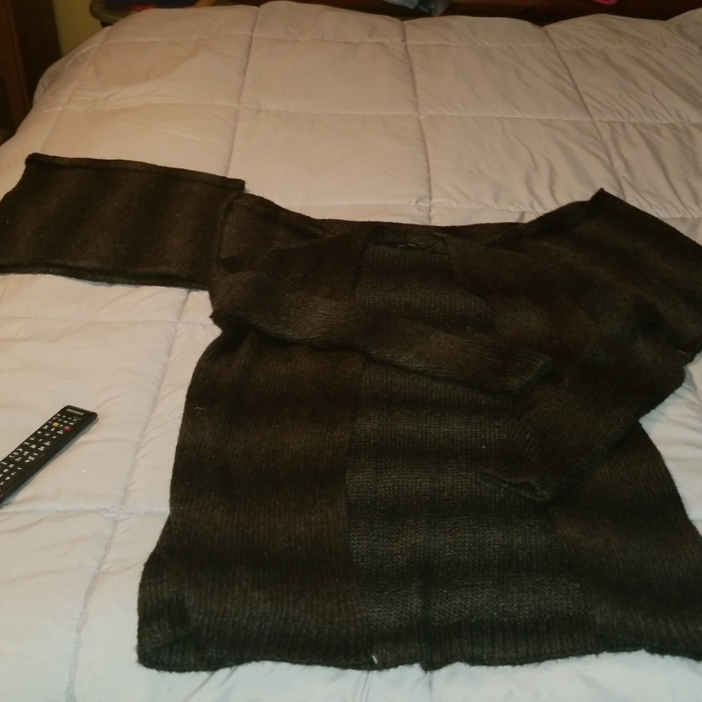 Gary and black sweater